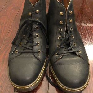 Men’s black leather Dr. Martens.